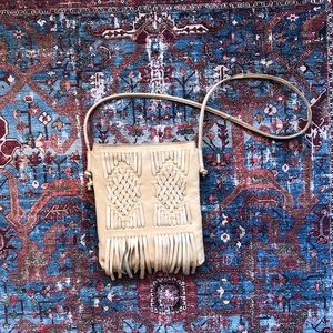 Cut n paste leather fringe bag